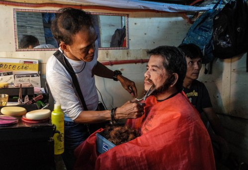 The volunteer make-up artist has been working with the Cenaculo of Malibay for three decades. He assists Mr. Jun Taytay, who plays Jesus.