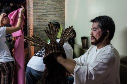 “I’ve played Jesus for almost 20 years, it is my vow,” said a retired nurse named Jun Taytay. I sat next to Jesus. A rickety fan was placed close to his face to help dry his woolly beard. His thick wig barely moved with the wind. He told me that a year ago he could barely walk—a back injury had left him partly immobile. He lifted his robe to reveal a metal brace strapped around his waist. I asked how his back felt today. “Great!” he said as he stood to return to the stage. “With faith, nothing is impossible.”